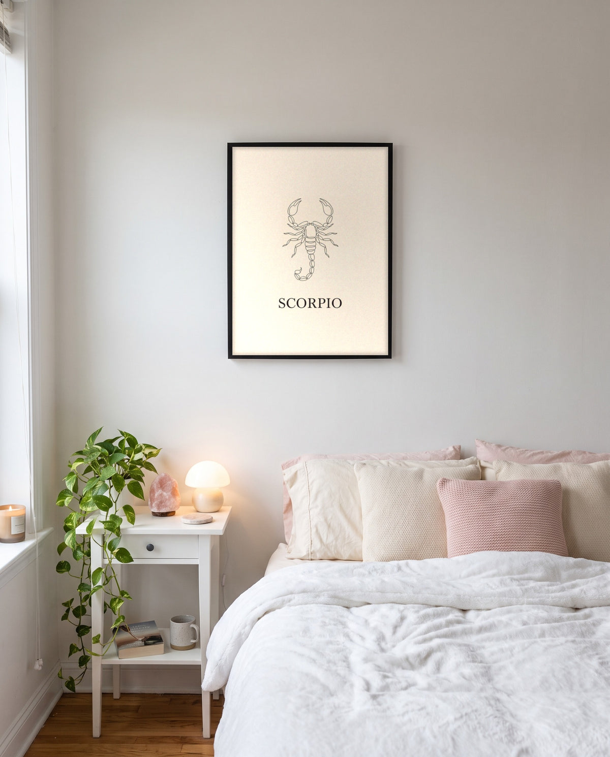 Scorpio Fine Line print in a black frame on a bedroom wall